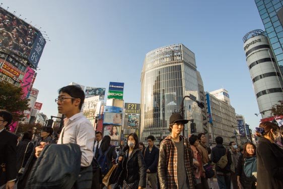Crowd of People Walking in the Street